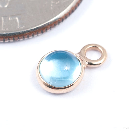 Bezel Charm in Gold from Modern Mood in yellow gold with blue topaz