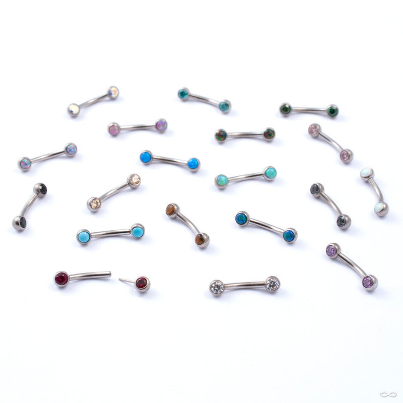 Curved Press-fit Post with Side-set Stones in Titanium from Neometal