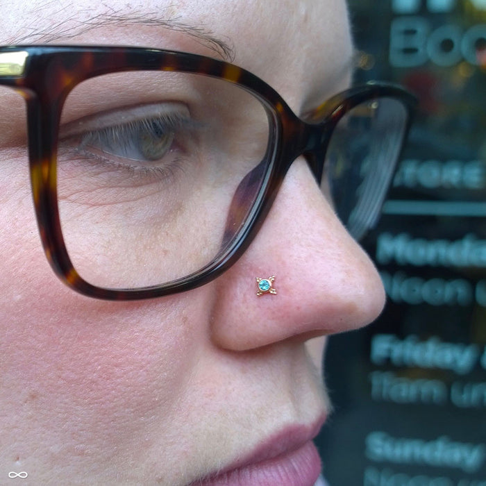 Nostril piercing with Mini Kandy Press-fit End in Gold from BVLA in Seafoam Tourmaline