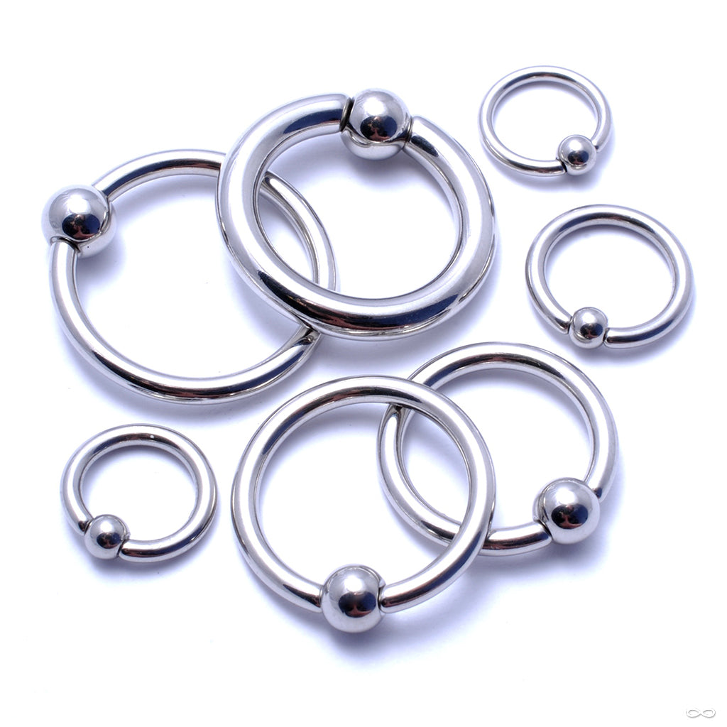 Captive bead rings from SM 316 in implant-grade stainless steel and niobium at Infinite Body Piercing