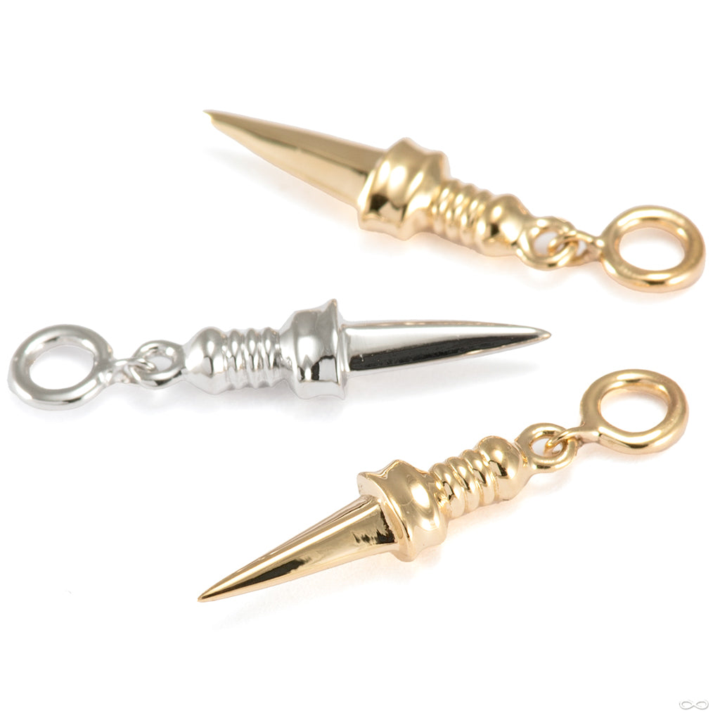 Group of gold charms from Infinite's piercing chains and charms collection