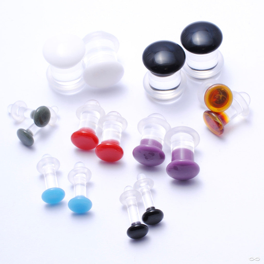 Collection of color front plugs by Gorilla Glass at Infinite Body Piercing