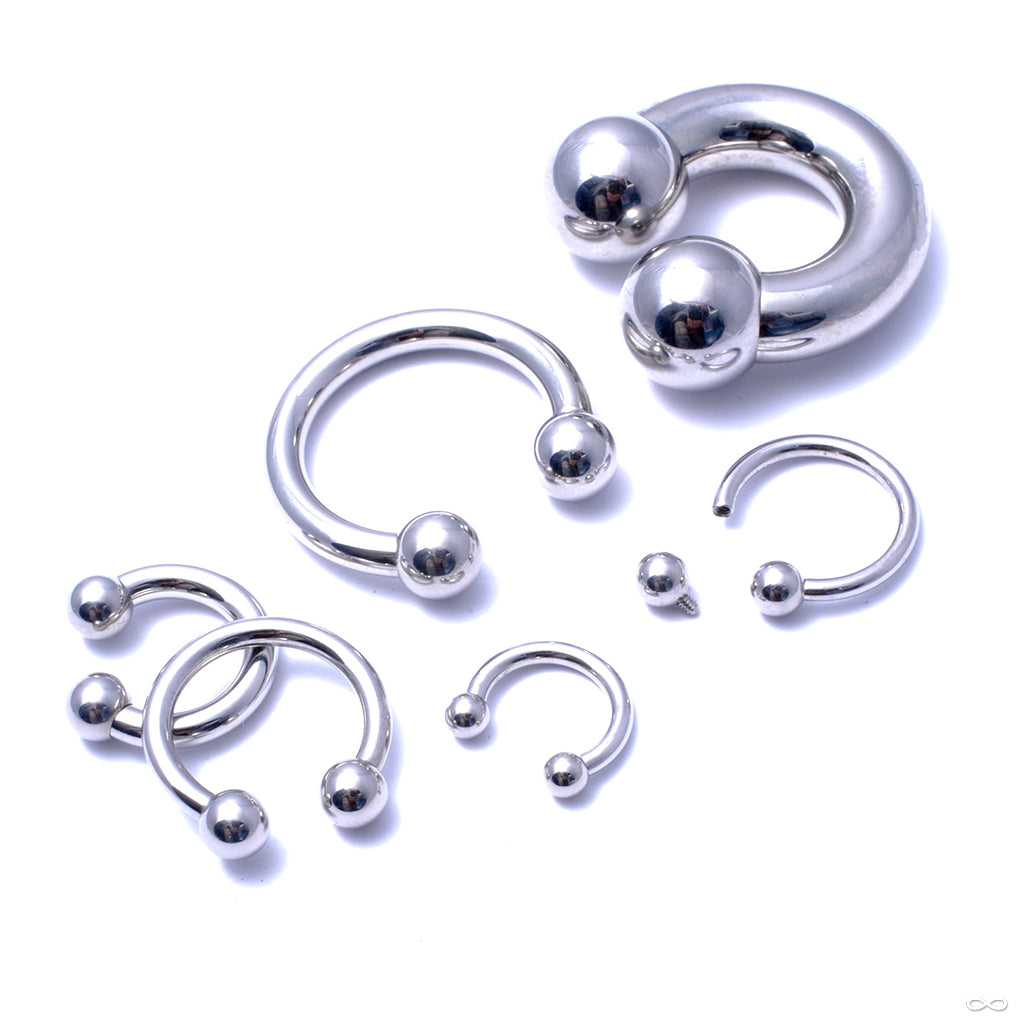 Group of circular threaded barbell jewelry from Industrial Strength at Infinite Body Piercing