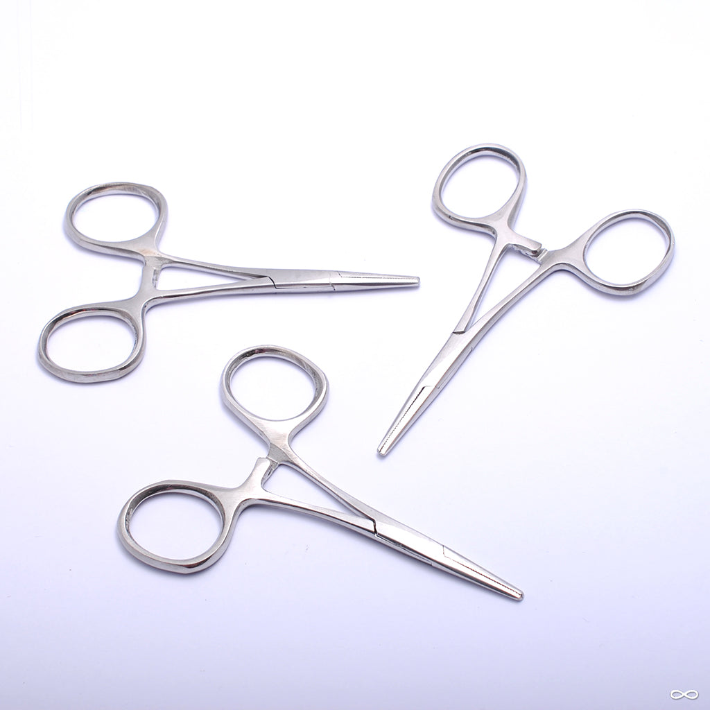 Set of hemostats, tools for helping with jewelry placement and removal