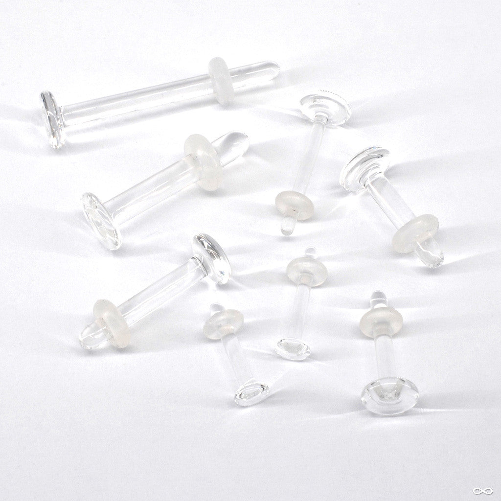 Collection of glass retainers for piercings in various sizes and gauges