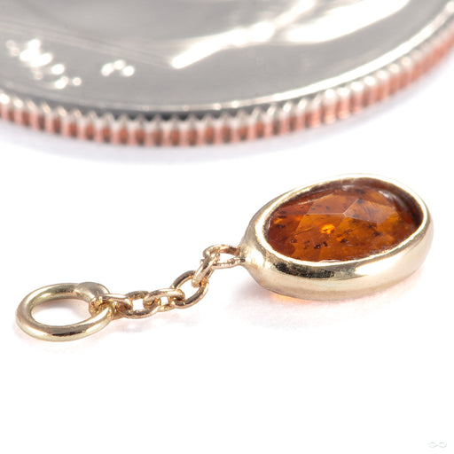 Bezel Oval Charm in 18k Yellow Gold with Hessonite Garnet from Diablo Organics side profile