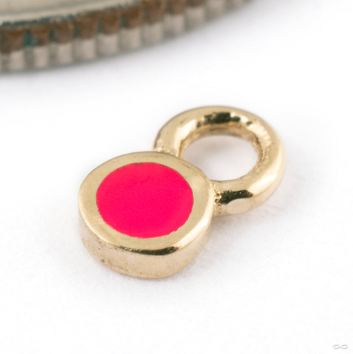 Bitty Polka Charm in Gold from Pupil Hall in 14k yellow gold with hot pink enamel