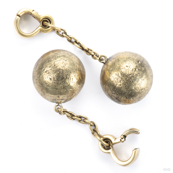 Brecking Ball in Brass from Symmetry Body Jewelry open