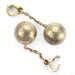 Brecking Ball in Brass from Symmetry Body Jewelry open