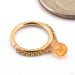 Briolette Seam Ring in Gold from Pupil Hall in 14k Yellow Gold with Mango Garnet