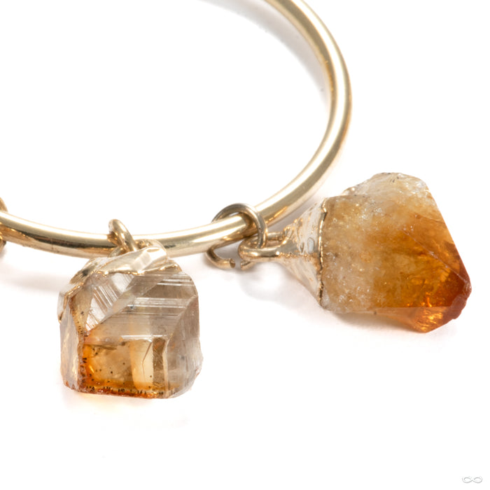 Crossovers in Brass with Citrine Tasseled Rings from Oracle stone detail