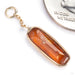 Elongate Charm in 18k Yellow Gold with Hessonite Garnet from Diablo Organics