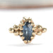 Equanimity Press-fit End in Gold from Sacred Symbols with blue sapphire