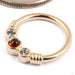 Faraway Seam Ring in Gold from BVLA in 14k Yellow Gold with Garnet and Tanzanite