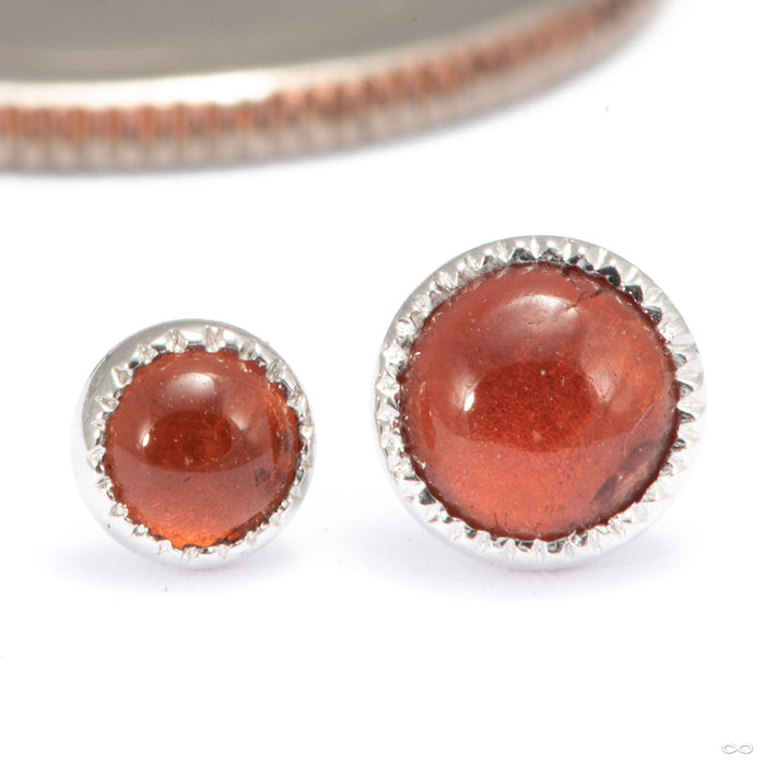 Grizant Cabochon Press-fit End in 14k 
White Gold with Garnet from Auris Jewellery