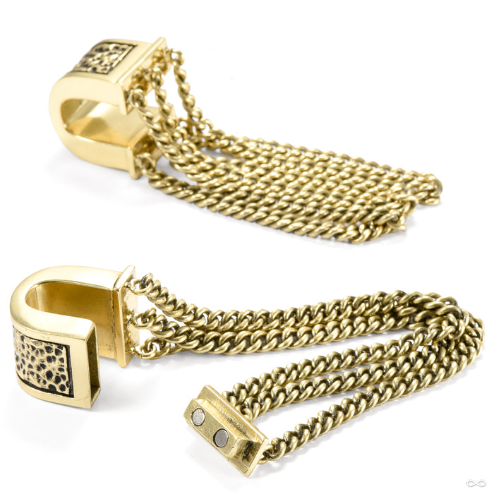 Hang In There Weights from Symmetry Body Jewelry in brass