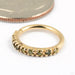 Hera Seam Ring in Gold from Tawapa in yellow gold with dark peridot cz
