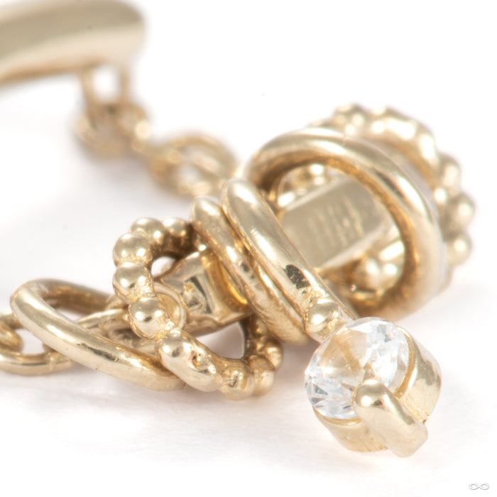 Horizontal A Few Things Hidden Press-fit End in 14k Yellow Gold with White Sapphire from Pupil Hall charms close-up