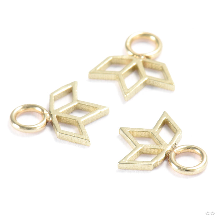 Lit Charm in Gold from Quetzalli in yellow gold