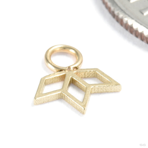 Lit Charm in Gold from Quetzalli in yellow gold