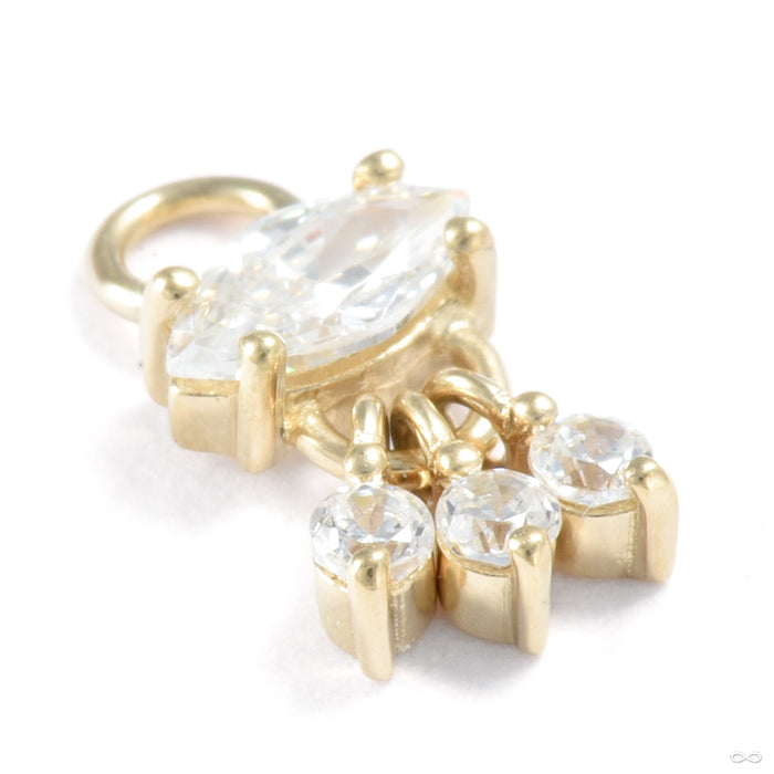Lust Charm in Gold from Ember Body Jewelry in assorted materials with clear CZ
