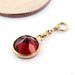 Mind the Gap Charm in 14k Yellow Gold with Garnet from Hialeah