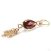 Ombligo Charm in Gold from Hialeah with garnet