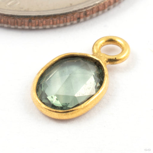 Oval Bezel Charm in Gold from Modern Mood in yellow gold with green tourmaline