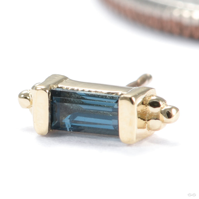 Siva Press-fit End in Gold from BVLA in yellow gold with london blue topaz detail