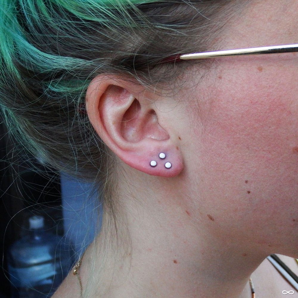 Earlobe piercings by Robert