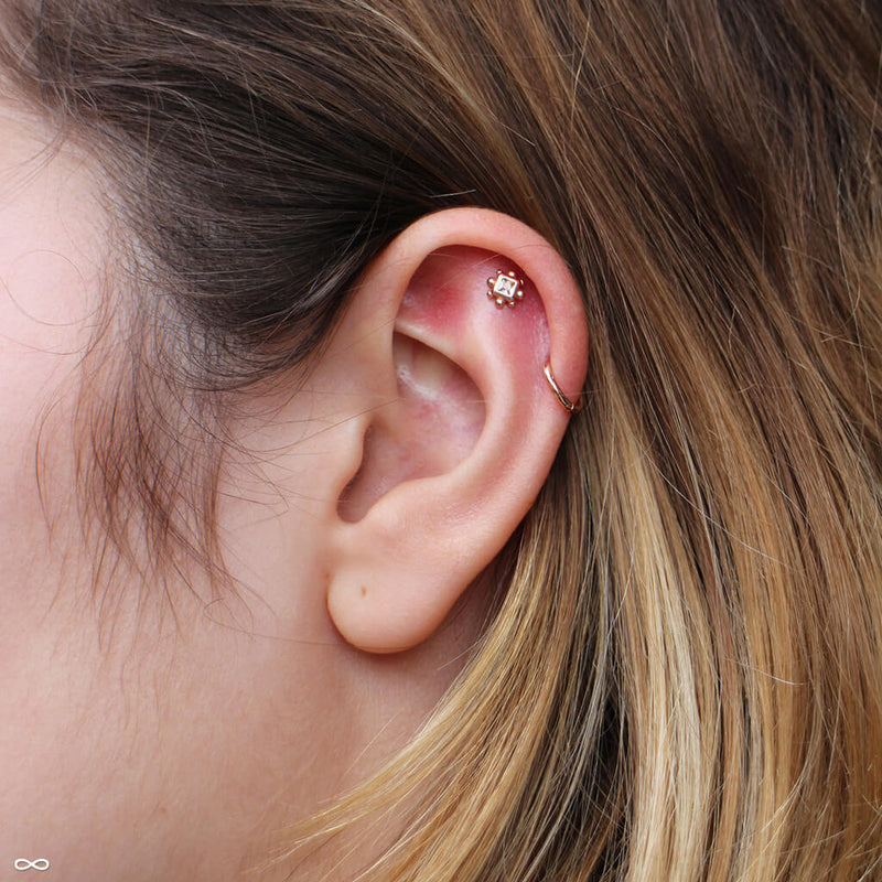 Outer helix piercing by John