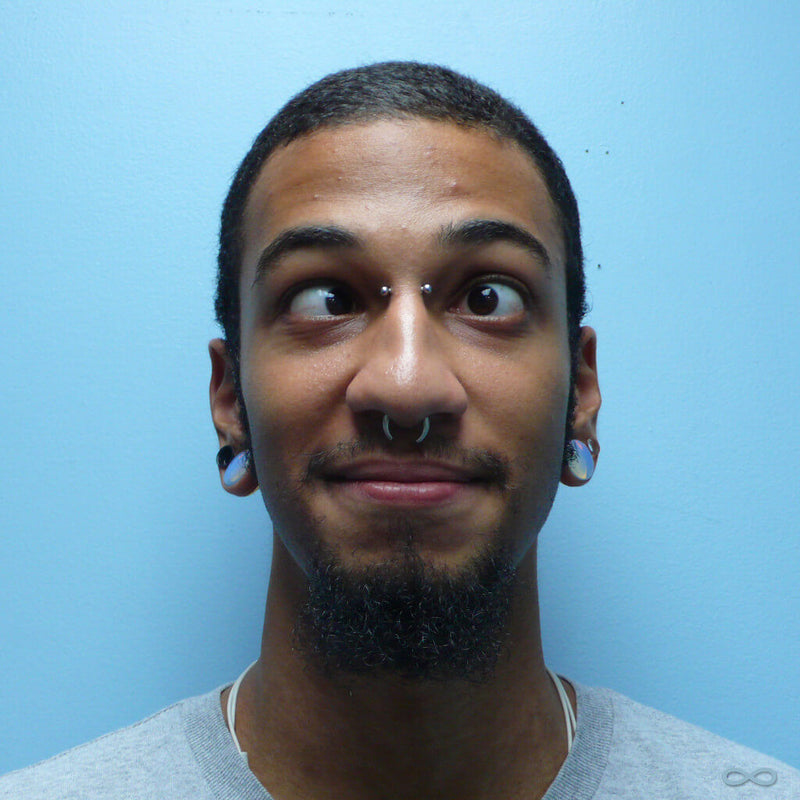 Bridge piercing by Kellan