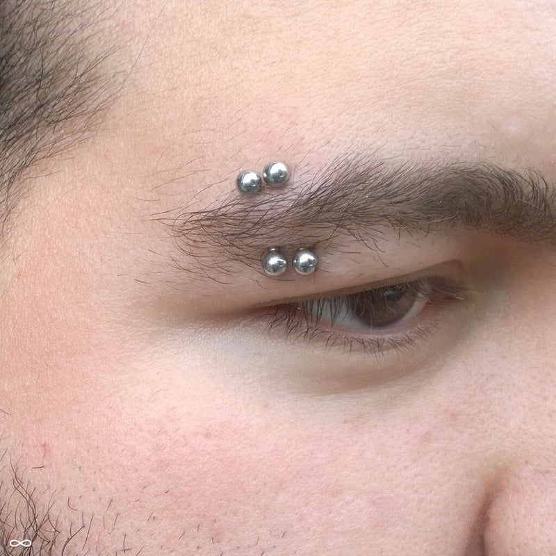 Eyebrow piercing by Zach