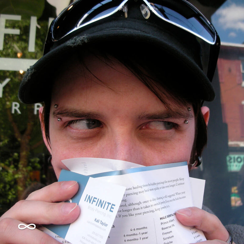 Eyebrow piercing by Kali