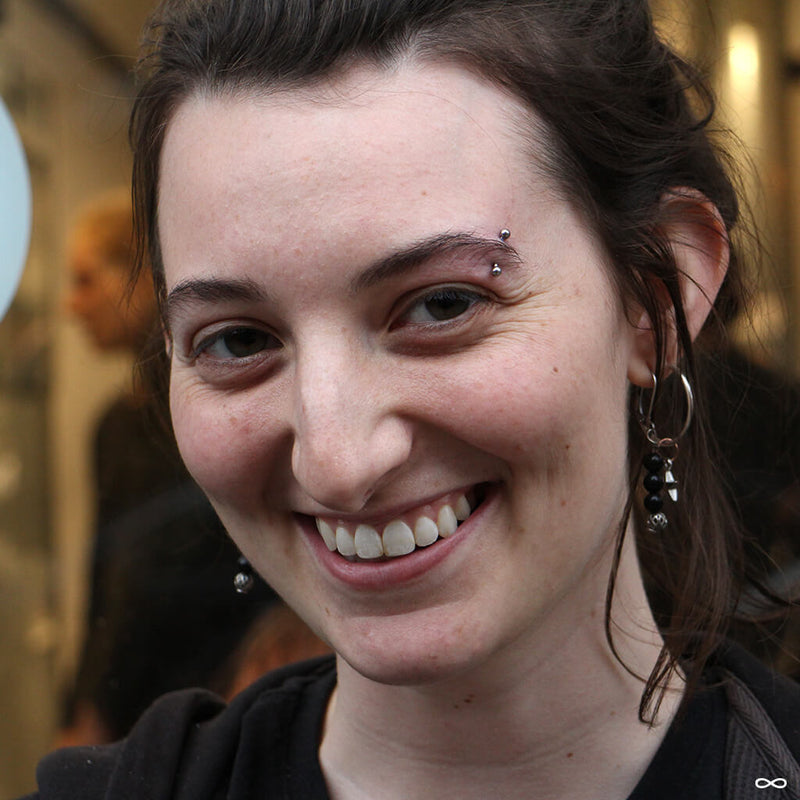 Eyebrow piercing by Anna