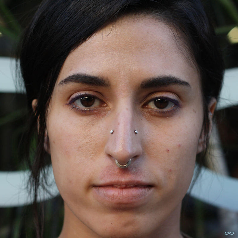 High Nostril piercings by Andru