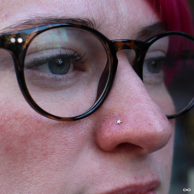 Nostril piercing by Anna