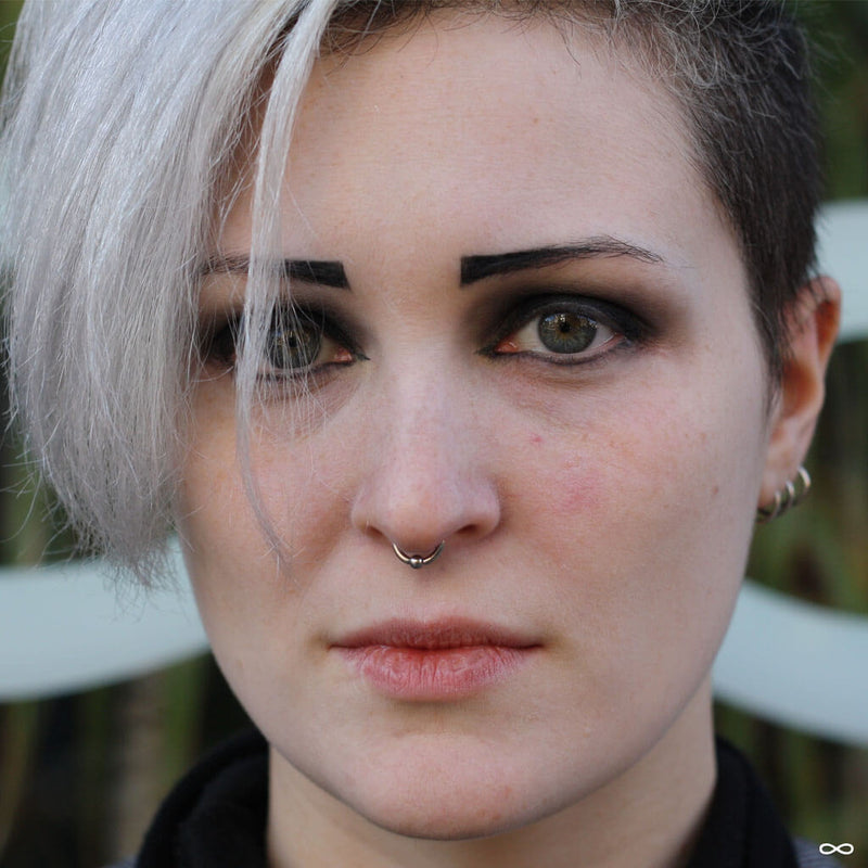 Septum piercing by Andru