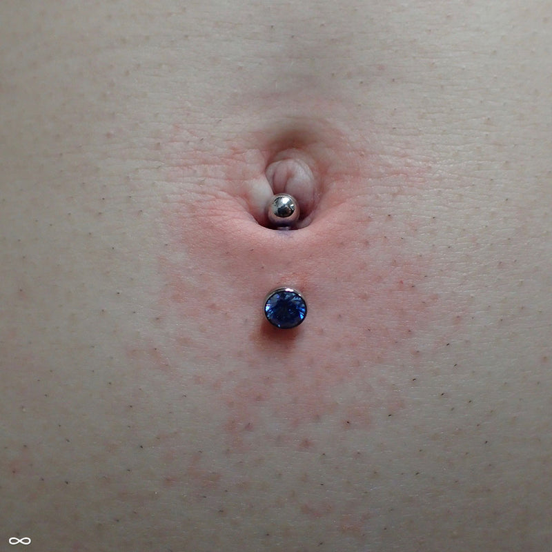 Lower navel piercing by Zach