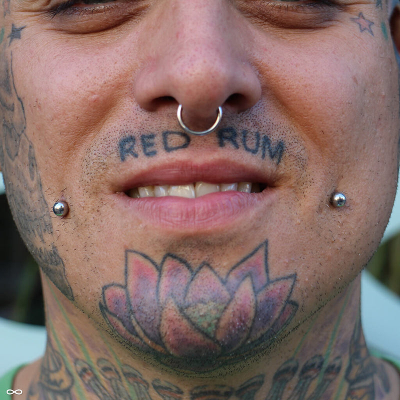 Cheek piercings by John