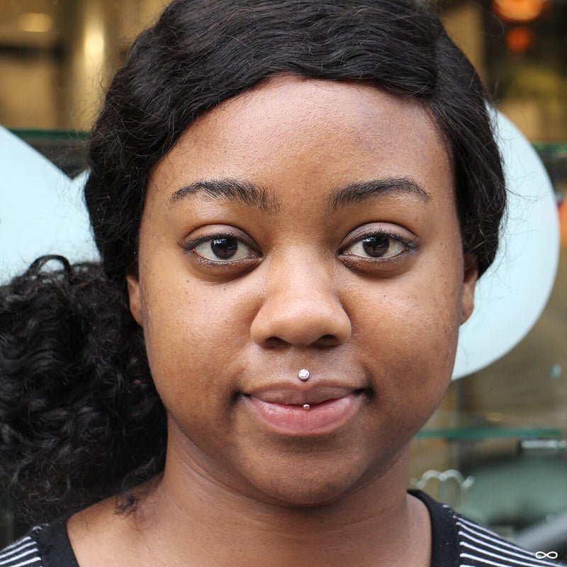 Vertical Philtrum piercing by Anna