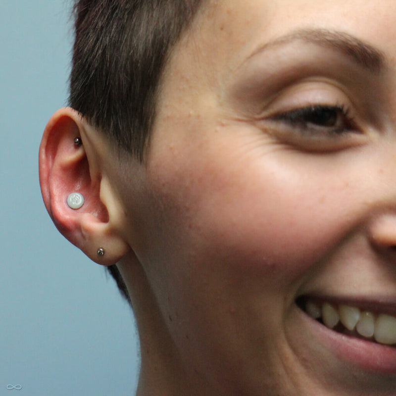 Large gauge conch piercing