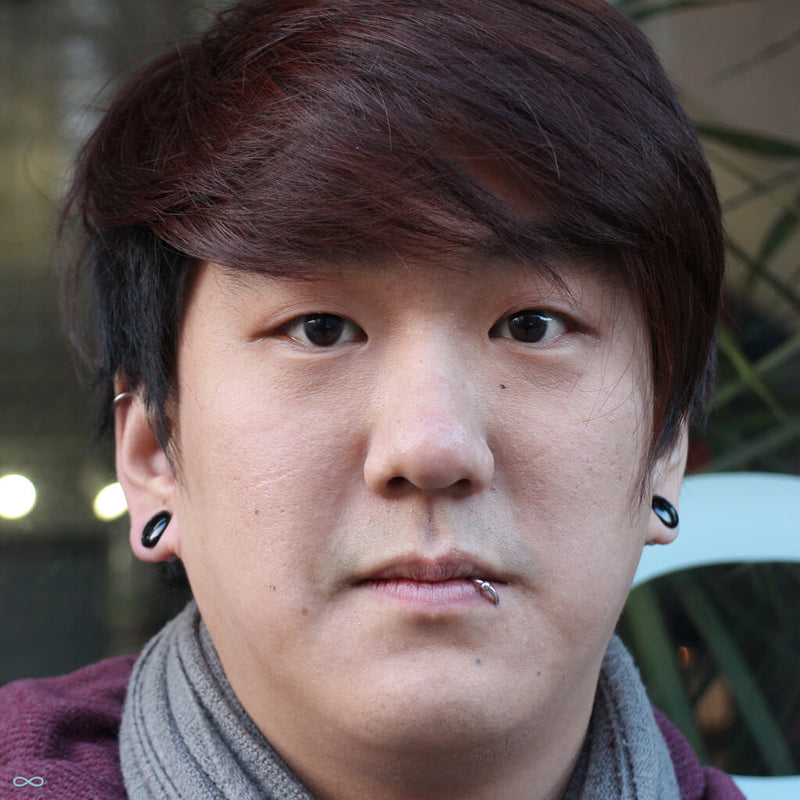 Stretched earlobe piercings