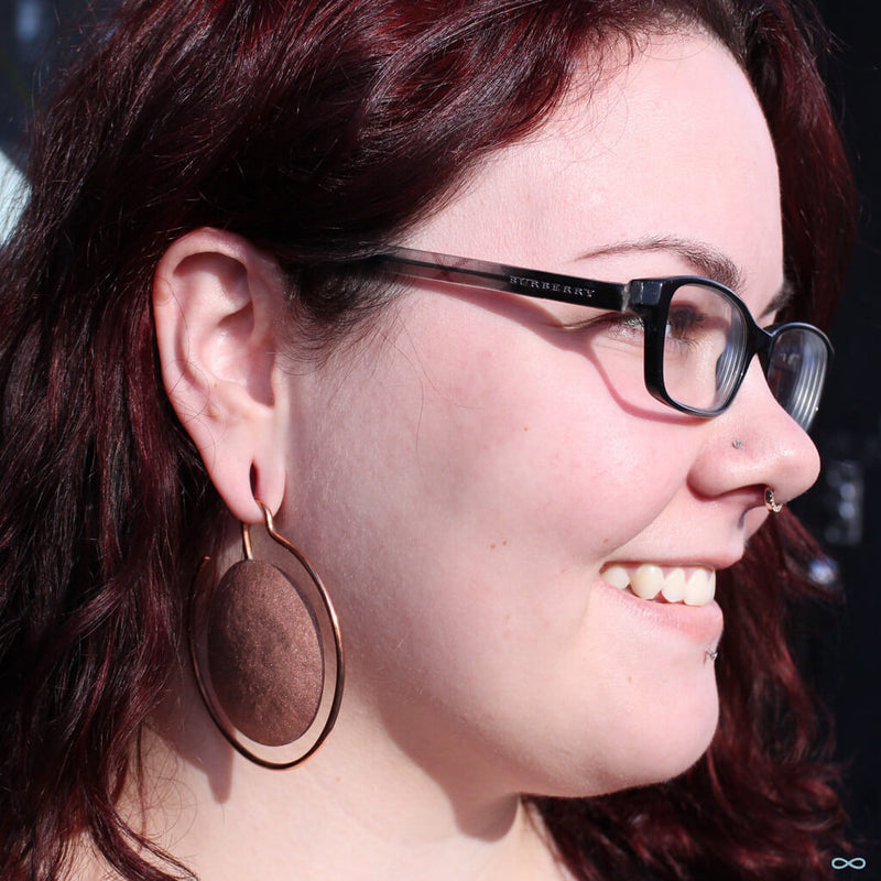 Stretched earlobe piercings