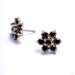 7 Stone Flower Press-fit End in Gold from LeRoi with Black CZ Petals & Center
