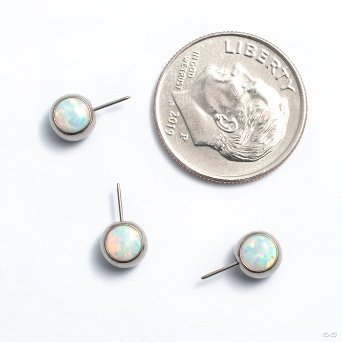Side-set Cabochon Press-fit End in Titanium from NeoMetal with white opal