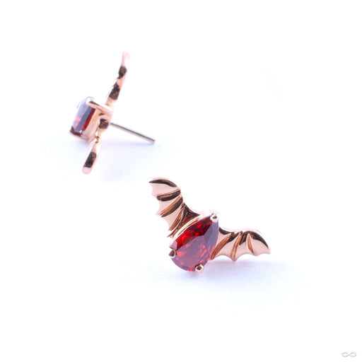 Bat with Stone Press-fit End in Gold from Junipurr Jewelry in rose gold with red CZ