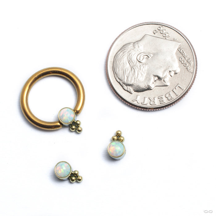 Bezel-set Captive Gem Bead with Tri Bead Cluster from LeRoi with white opal shown in ring