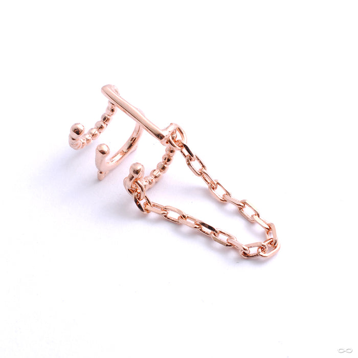 Chained Love Cuff from Tawapa in rose gold right ear