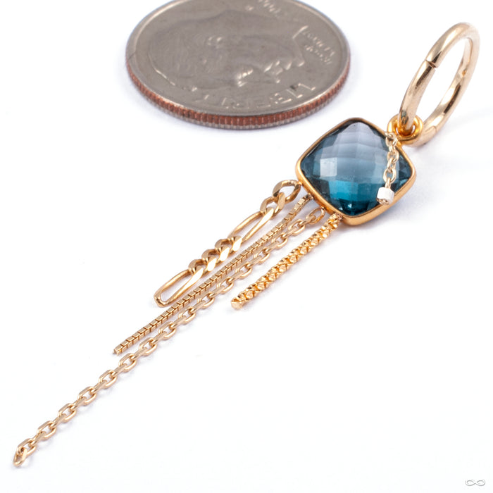 Compulsive Collector Clicker in Gold from Pupil Hall in yellow gold with london blue topaz